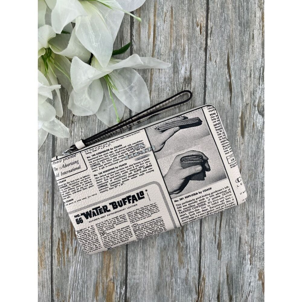 Coach Large Corner Zip Wristlet With Newspaper Print Pebbled Leather Bag